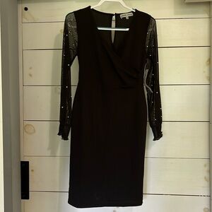 NEW WITH TAGS!! Absolutely FAMOUS black fitted dress with pearls